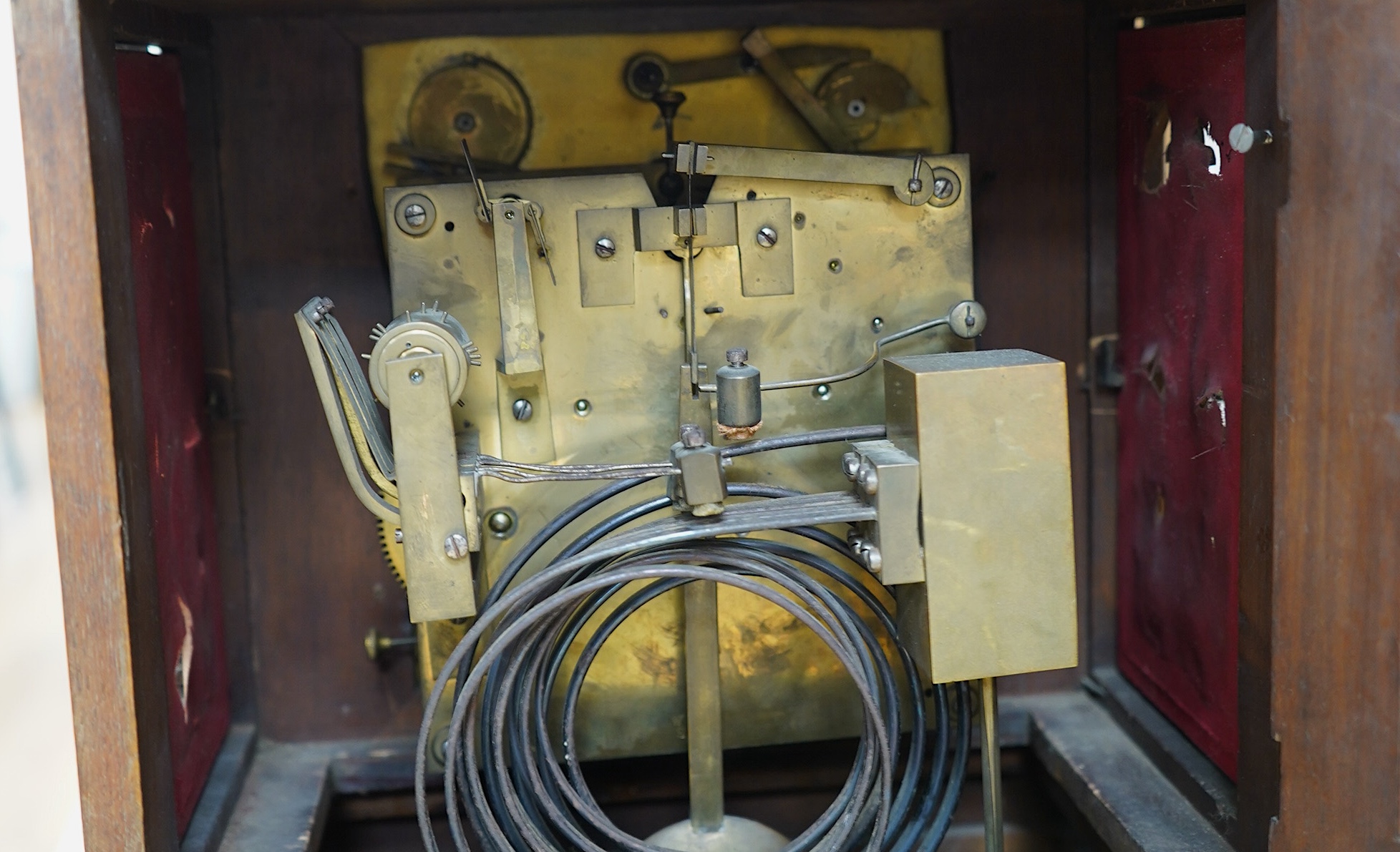 A late 19th century German mahogany W and H clock with a three train movement, striking and chiming on five coiled gongs, 42cm. Condition - fair to good, not tested, but understood from the vendor to be in working order